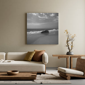 Martha’s Vineyard seascape with white surf sweeping around a shoreline rock