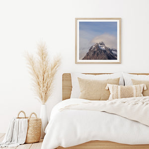 Rugged rocky peak with snow on its upper slopes in the Martial Mountains