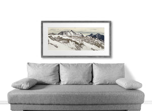 Snow and rugged rock form layered ridges in an Argentine mountain landscape