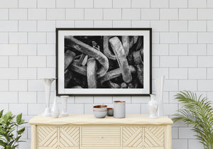 Ethereal glow highlighting the robust contours of massive chains, reflecting their historical significance and resilience.