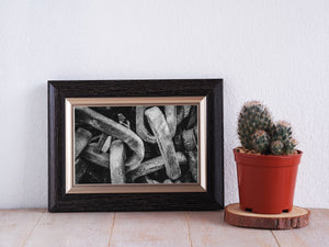 Wide-angle view of massive chains draped gracefully, conveying a sense of their heavy-duty and industrial nature.