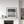 Black and white study of locker-door textures and orderly vertical rows