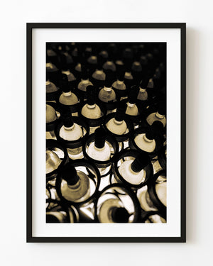 Warm-toned photograph of wine bottles arranged in a Mexican cellar