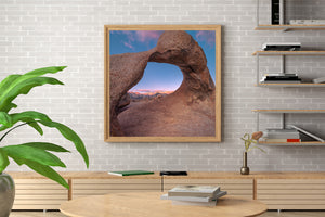 Textured rock curves around a mountain view in the Alabama Hills