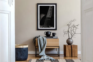 Electric guitar strings and frets close up