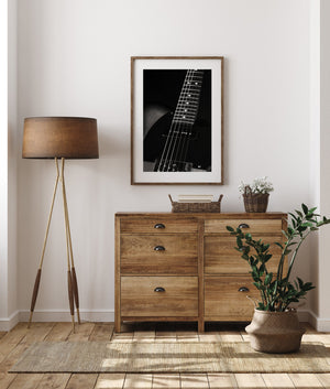 Black guitar detail photograph for wall decor