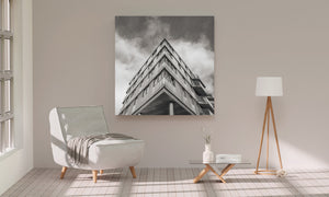 A low corner view emphasizes geometric lines and repeated windows
