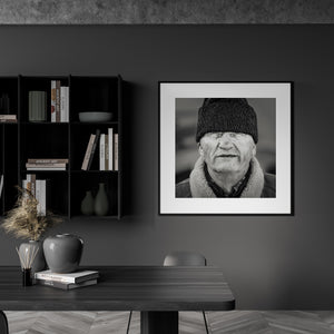Monochrome street portrait elderly Romanian villager face detail