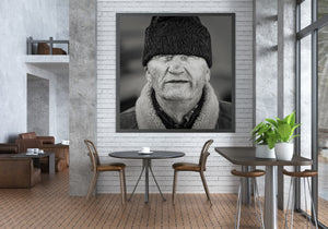 Headshot of elderly man with fleece collar black and white