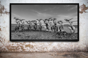 Black and white photograph of Mongolian eagle riders