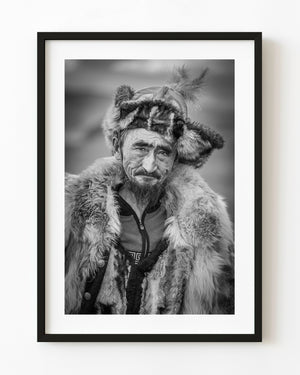 Mongolian eagle hunter portrait in fur clothing black and white