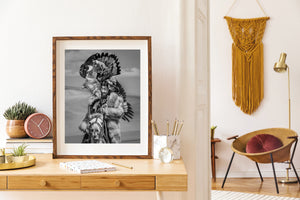 Golden eagle feathers framing a mounted Mongolian hunter