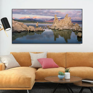 California lake landscape with limestone towers and distant mountain ridges