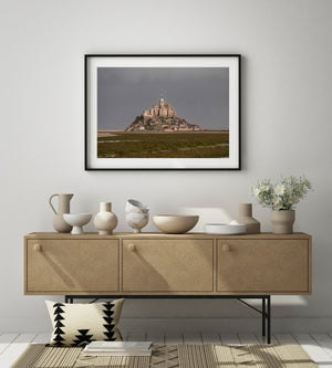 Colour landscape of Mont Saint-Michel seen across low coastal grassland