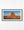 Monument Valley butte glowing orange beneath a clear blue sky