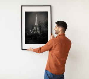 Fine art image of the Eiffel Tower in Paris surrounded by leafless branches