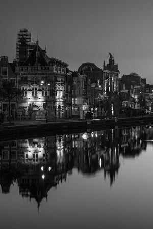 Pre dawn cityscape with reflected architecture