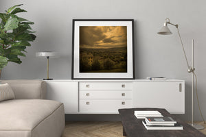 Moody countryside photograph of Tuscany beneath heavy clouds