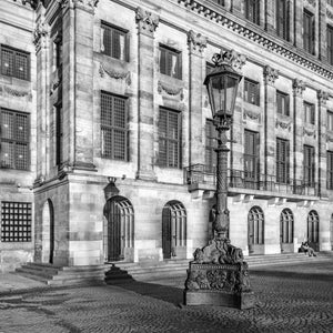 Sunrise on historic building in Dam Square