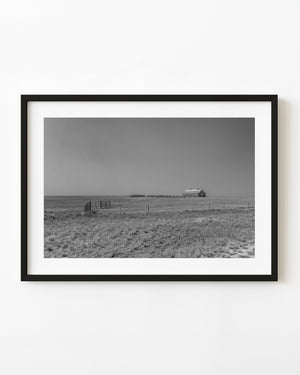 Isolated barn on the Nebraska prairie in black and white