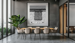 Nebraska barn window covered with weathered sliding wooden shutters