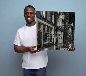 Historic Amsterdam night street in black and white