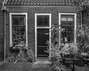 Historic Dutch doorway and windows in monochrome