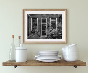 Traditional Dutch architecture with window reflections