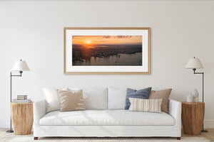 New Jersey cityscape with boats on the Hudson River at sunset