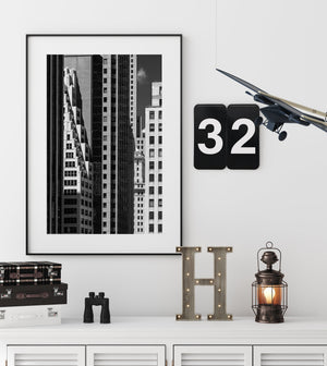 New York architectural detail with repeating window grids and contrasting light and shadow.