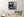New York City facade with graffiti tags and pasted character artwork