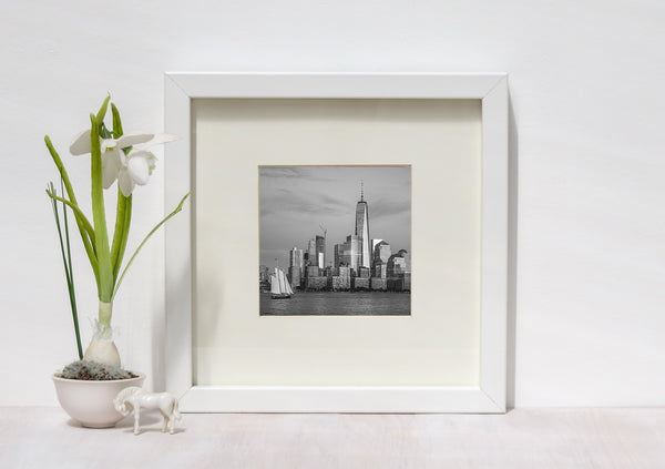 NYC cityscape with sailboat in black and white