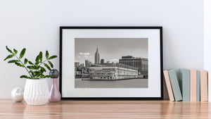 Historic Pier 57 facade with the Empire State Building behind it