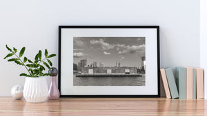 Manhattan buildings and the Empire State Building behind Pier 76