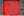 Bright red industrial doorway set into dark New York brickwork
