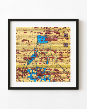 Peeling yellow paint and a blue street-art figure on a New York brick wall