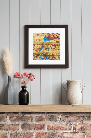 Yellow painted bricks and a weathered blue mural in New York