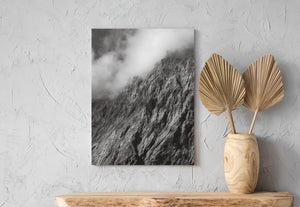 Monochrome landscape of a rocky New Zealand ridge beneath clouds