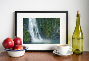 Remote fjord waterfall captured from water level in Milford Sound
