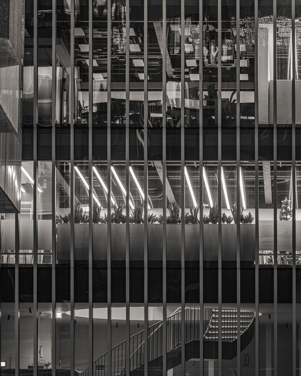 Modern office building in London illuminated at night