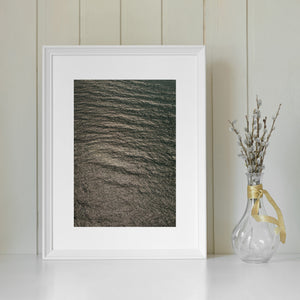 Shimmering wave textures across open Pacific water