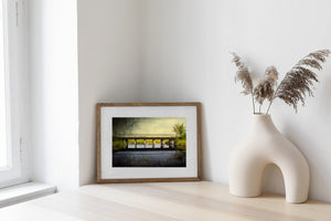 Northern Ontario bridge spanning a tree-lined wetland