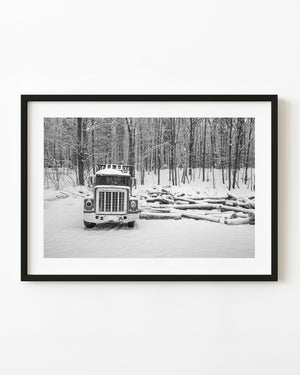 Abandoned logging truck in snow