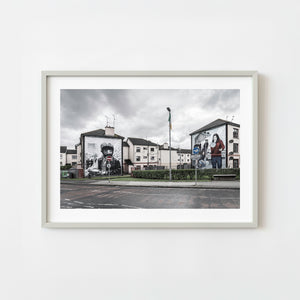 Black and white murals on residential buildings in Derry Northern Ireland