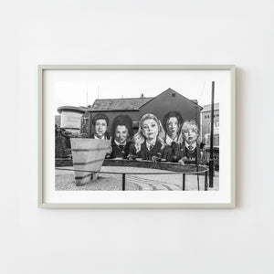 Black and white mural of schoolgirls in Bogside Derry Northern Ireland