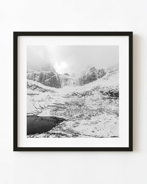 Snowy mountains and lake in Norway black and white