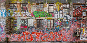 Graffiti wall photograph showing bright red and green artwork in Oslo Norway