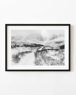 Icy roadway through Norwegian mountains