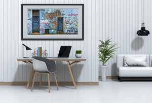 Peeling paint and brick textures on graffiti-covered wall