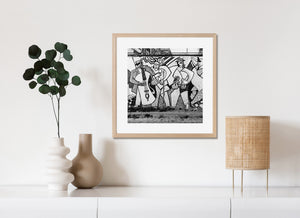 Black and white street photograph of stylized musicians in Havana